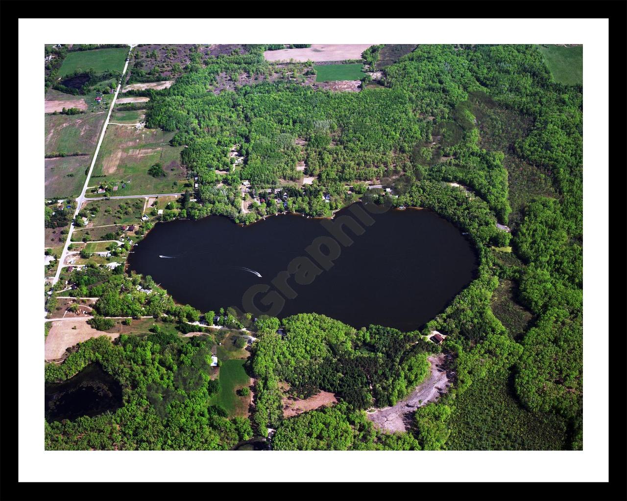 Aerial image of [104] Brady Lake in Mecosta, MI with Black Metal frame