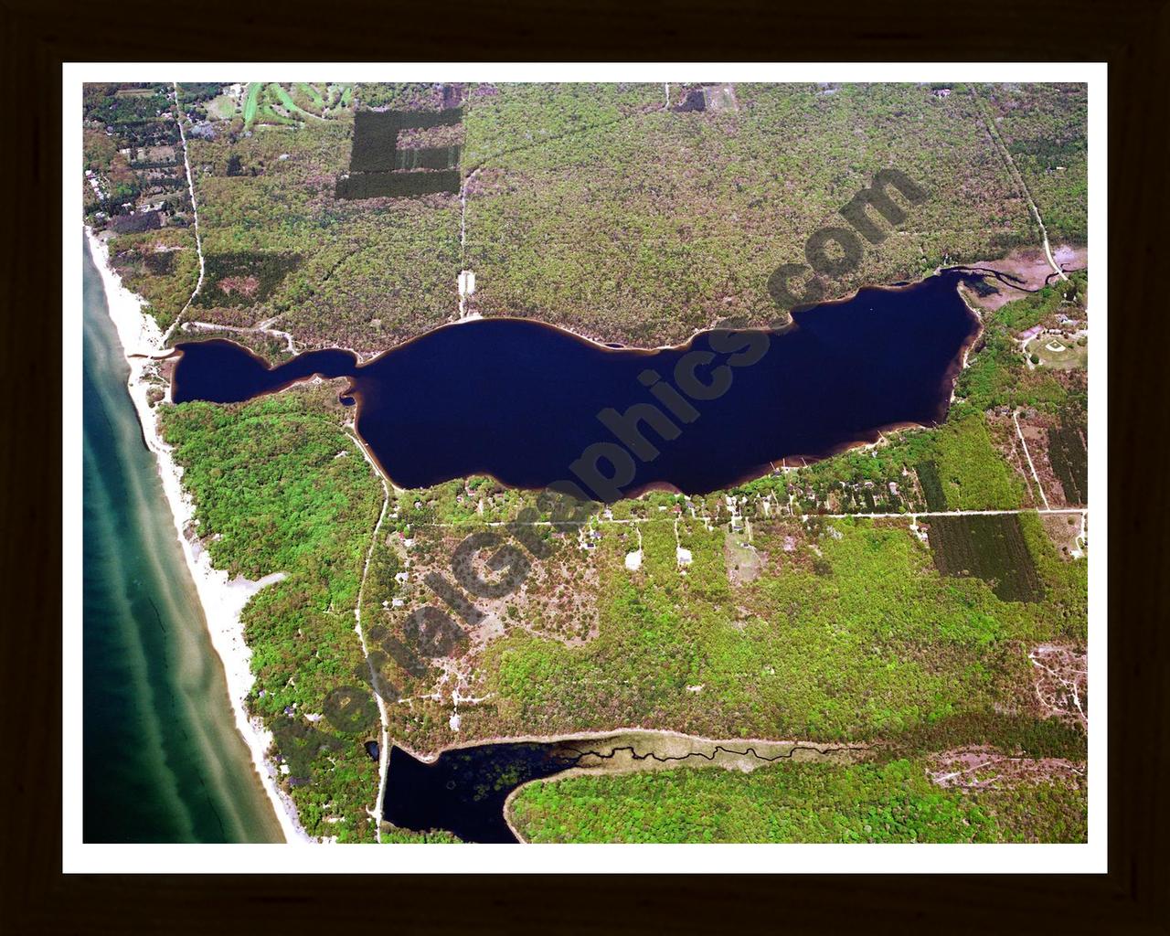 Aerial image of [1055] Duck Lake in Muskegon, MI with Black Wood frame