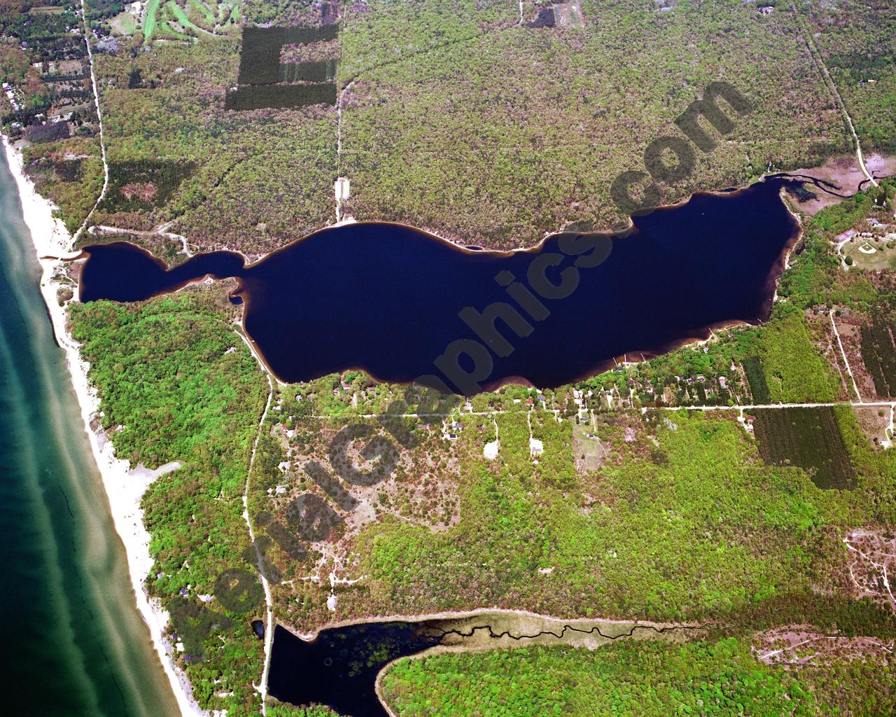 Aerial image of [1055] Duck Lake in Muskegon, MI with Canvas Wrap frame