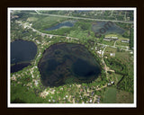 Aerial image of [107] Briggs Lake in Livingston, MI with Black Wood frame