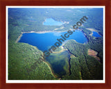 Aerial image of [1134] Nichols Lake in Newaygo, MI with Cherry Wood frame