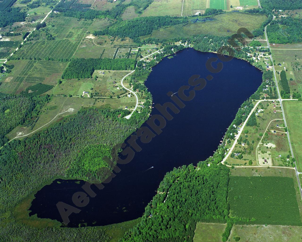 Aerial image of [1140] Crawford Lake in Kalkaska, MI with Canvas Wrap frame