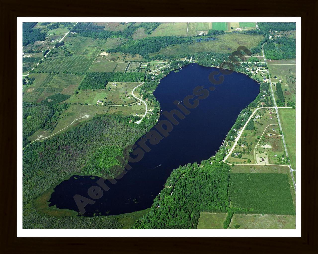 Aerial image of [1140] Crawford Lake in Kalkaska, MI with Black Wood frame