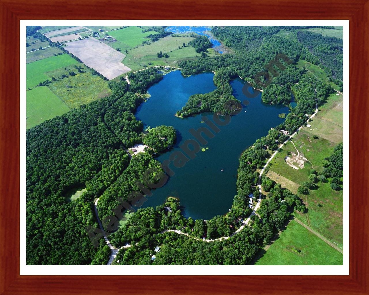 Aerial image of [1142] Negaunee Lake in Osceola, MI with Cherry Wood frame