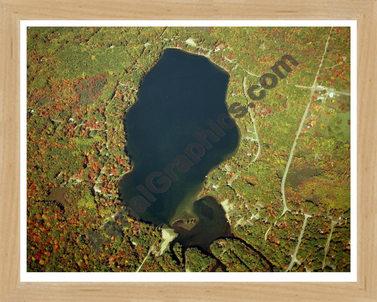 Aerial image of [1266] Arnold Lake (Fall) in Clare, MI with Natural Wood frame