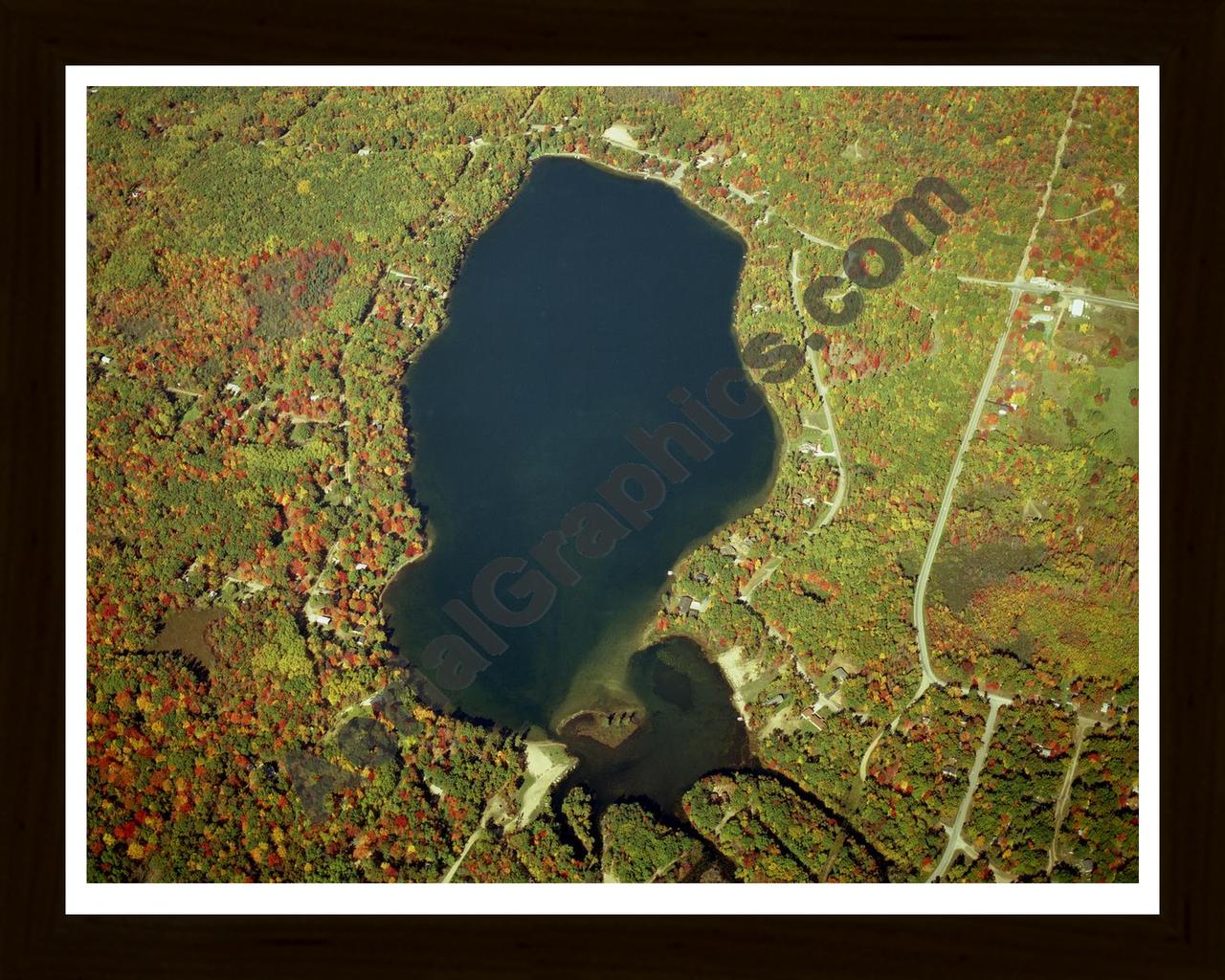 Aerial image of [1266] Arnold Lake (Fall) in Clare, MI with Black Wood frame