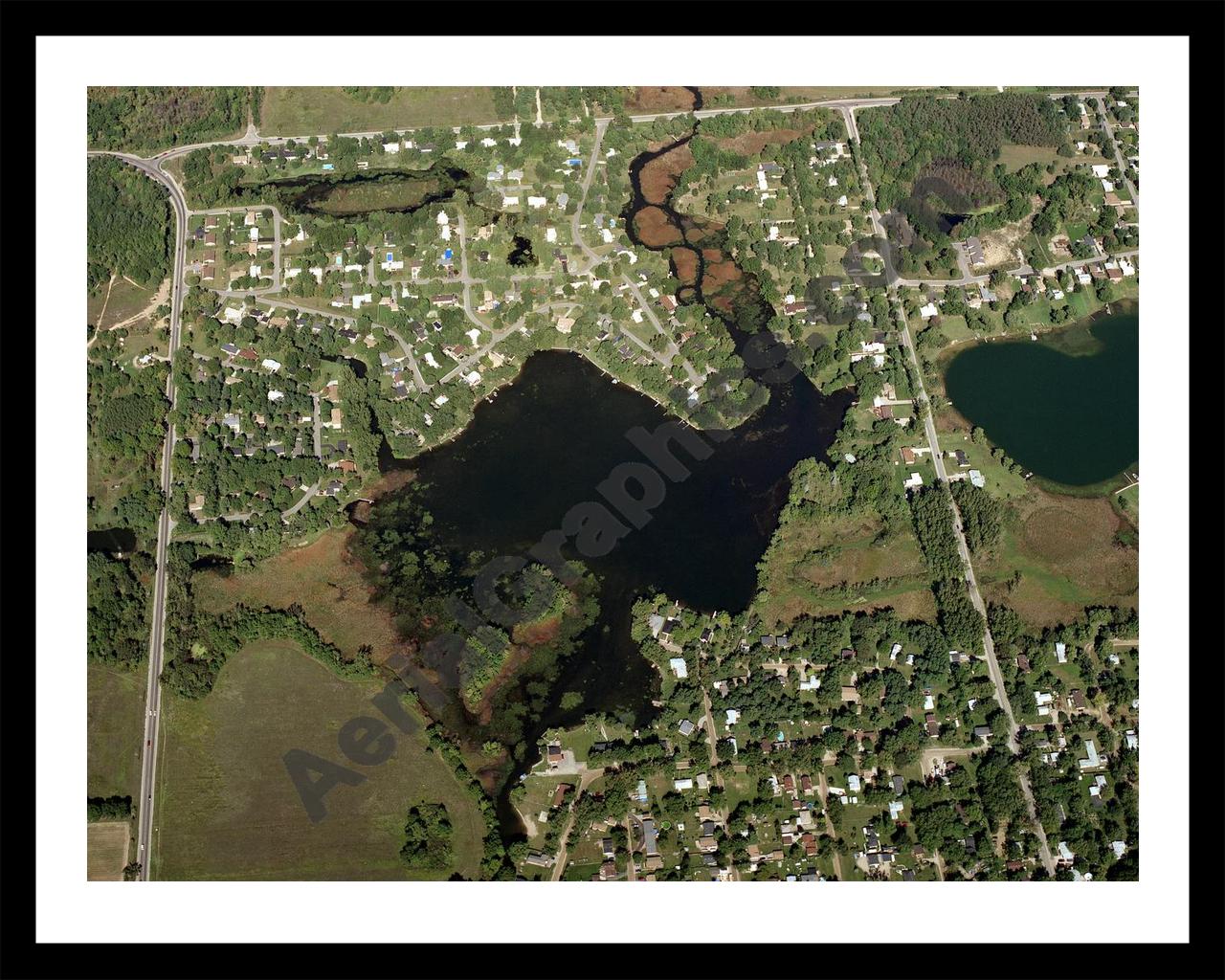 Aerial image of [1369] Fox Lake in Oakland, MI with Black Metal frame