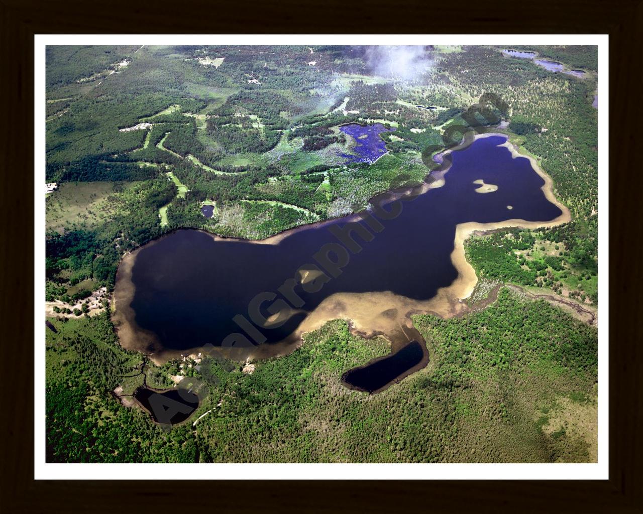 Aerial image of [1425] Valentine Lake in Montmorency, MI with Black Wood frame