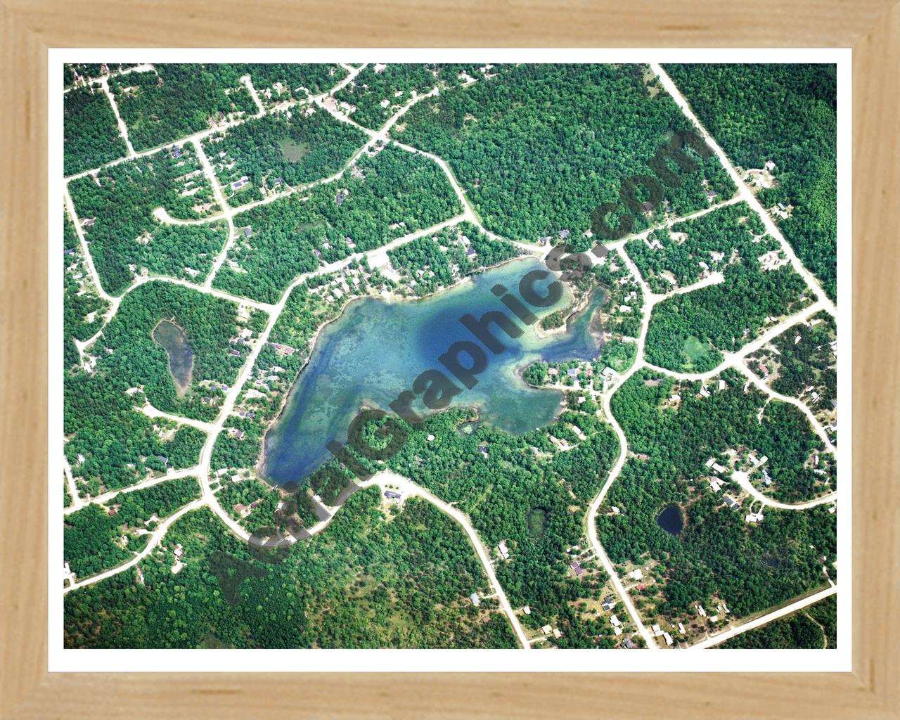 Aerial image of [1430] Moon Lake in Montmorency, MI with Natural Wood frame