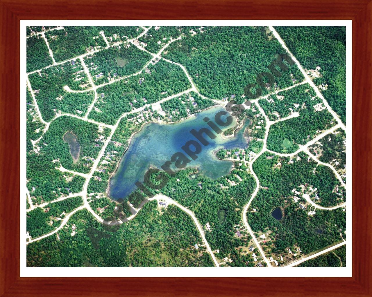 Aerial image of [1430] Moon Lake in Montmorency, MI with Cherry Wood frame