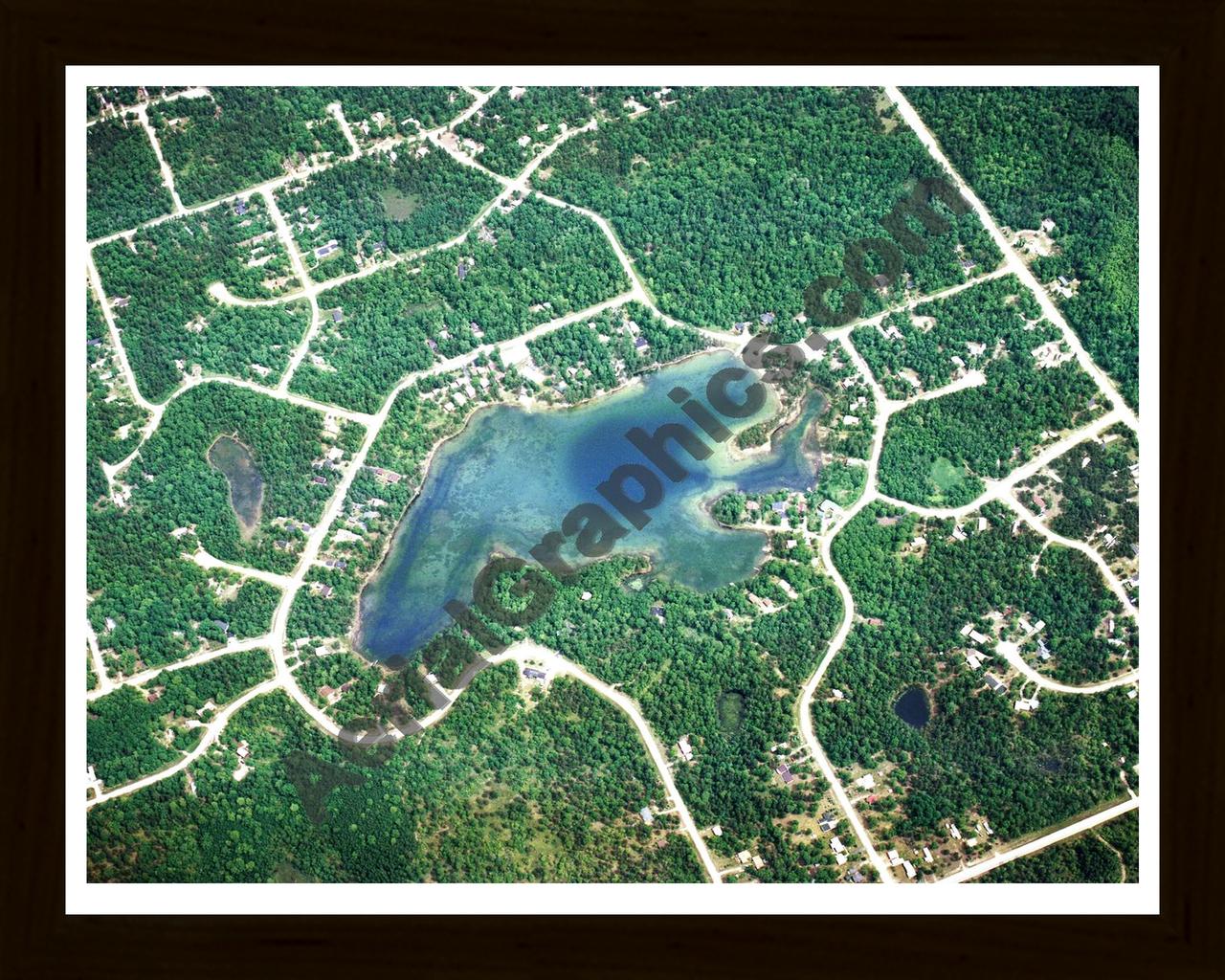 Aerial image of [1430] Moon Lake in Montmorency, MI with Black Wood frame