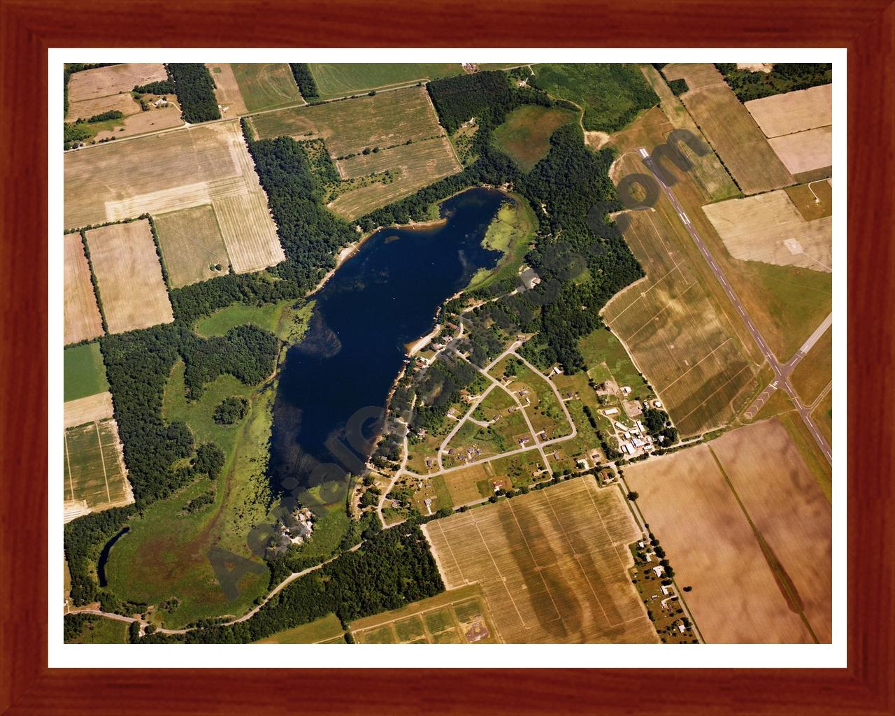 Aerial image of [1516] Minnewaukan Lake in St Joseph, MI with Cherry Wood frame