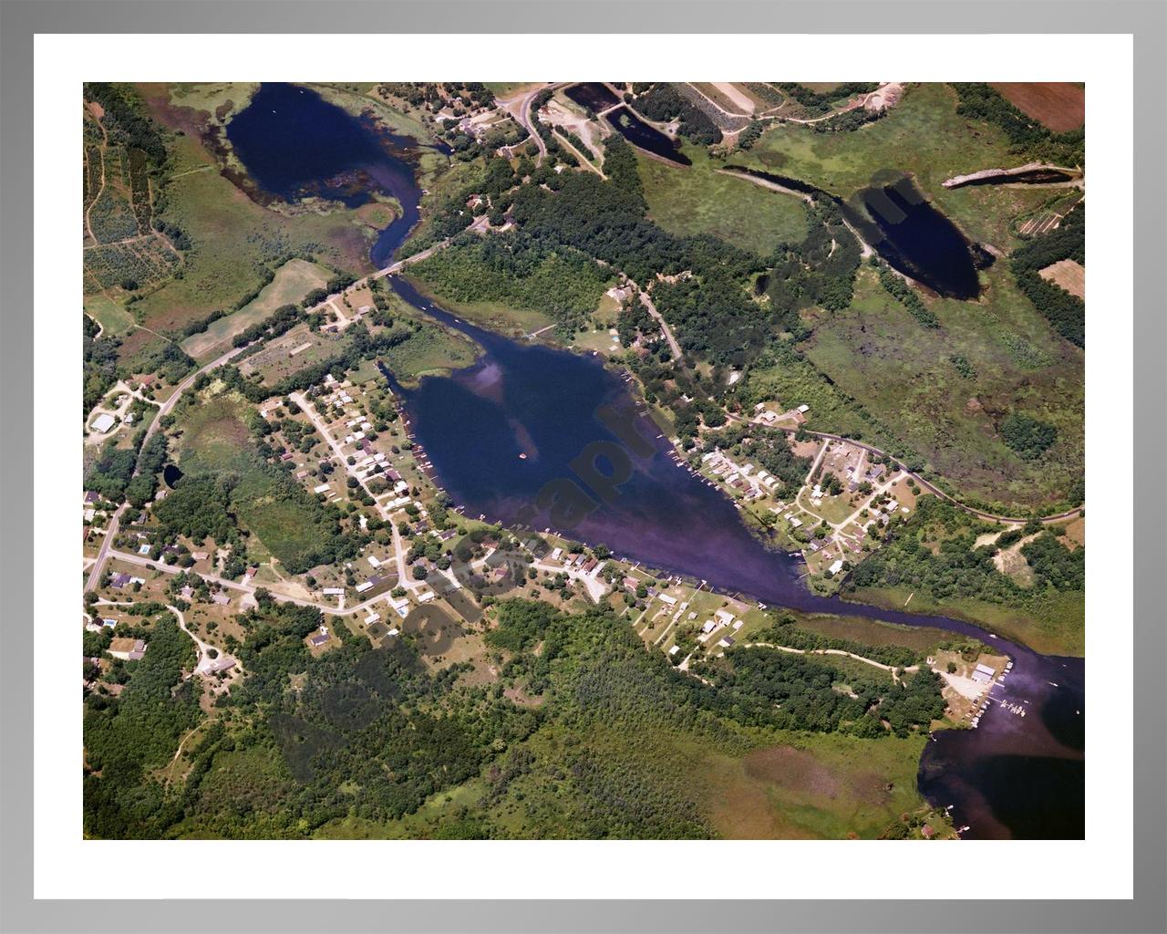 Aerial image of [1525] Olcott Lake in Jackson, MI with Silver Metal frame