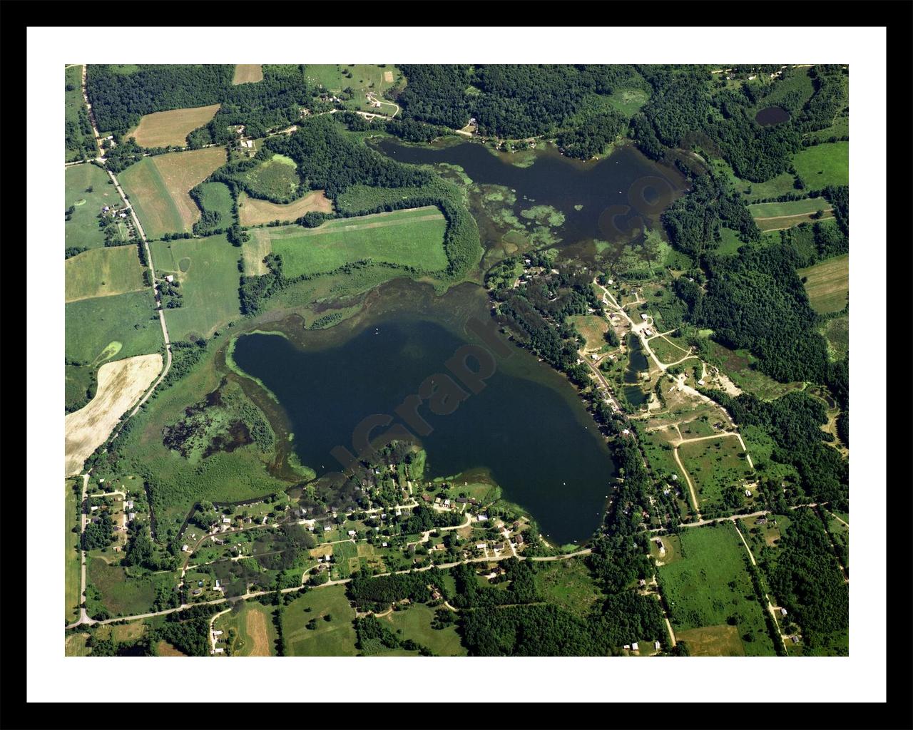 Aerial image of [1526] Guernsey Lake in Barry, MI with Black Metal frame