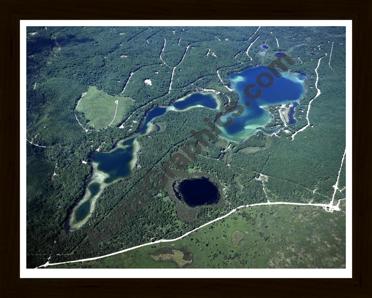 Aerial image of [1556] Guthrie Lake, Marsh Lake & Section One Lake in Otsego, MI with Black Wood frame