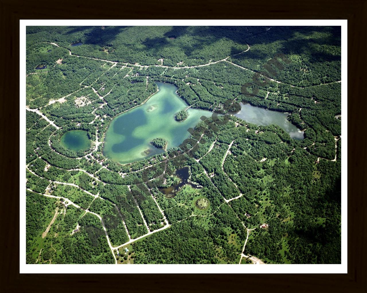 Aerial image of [1557] Buhl Lake in Otsego, MI with Black Wood frame