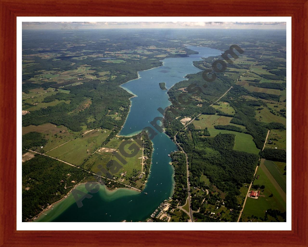 Aerial image of [1561] Lake Charlevoix (South Arm) in Charlevoix, MI with Cherry Wood frame