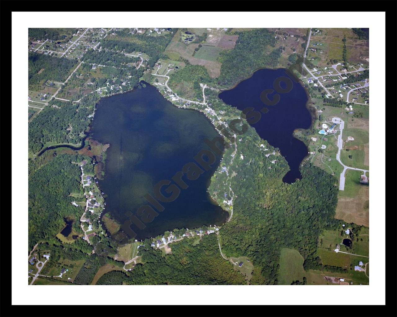 Aerial image of [1592] Pleasant Lake and Pero Lake in Lapeer, MI with Black Metal frame