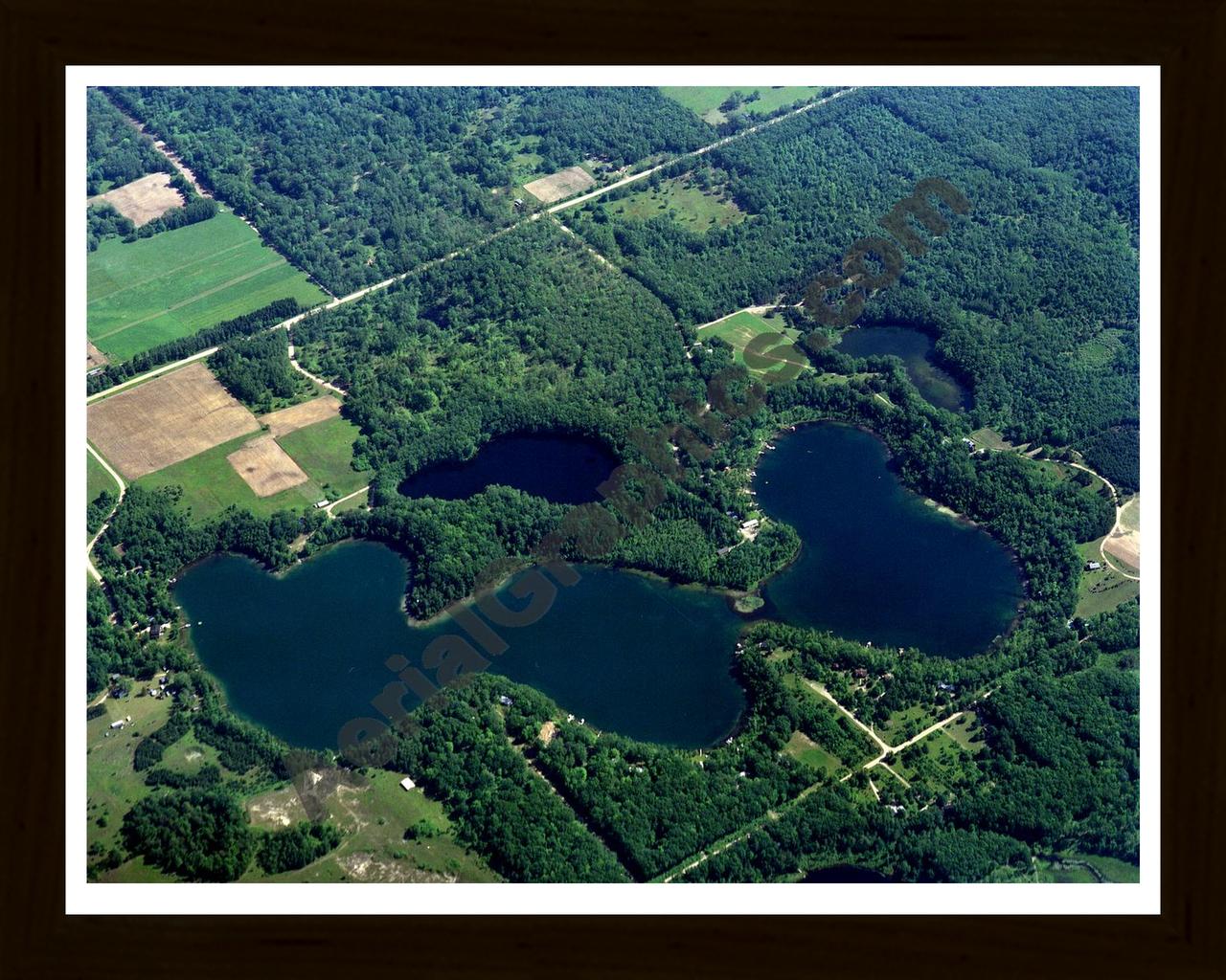 Aerial image of [172] Cool Lake in Lake, MI with Black Wood frame