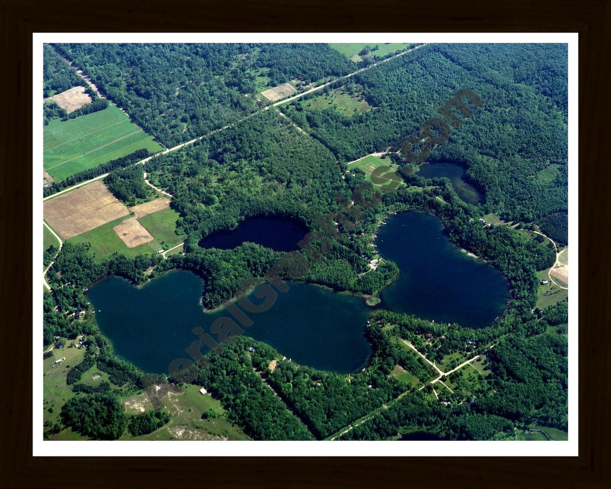 Aerial image of [172] Cool Lake in Lake, MI with Black Wood frame