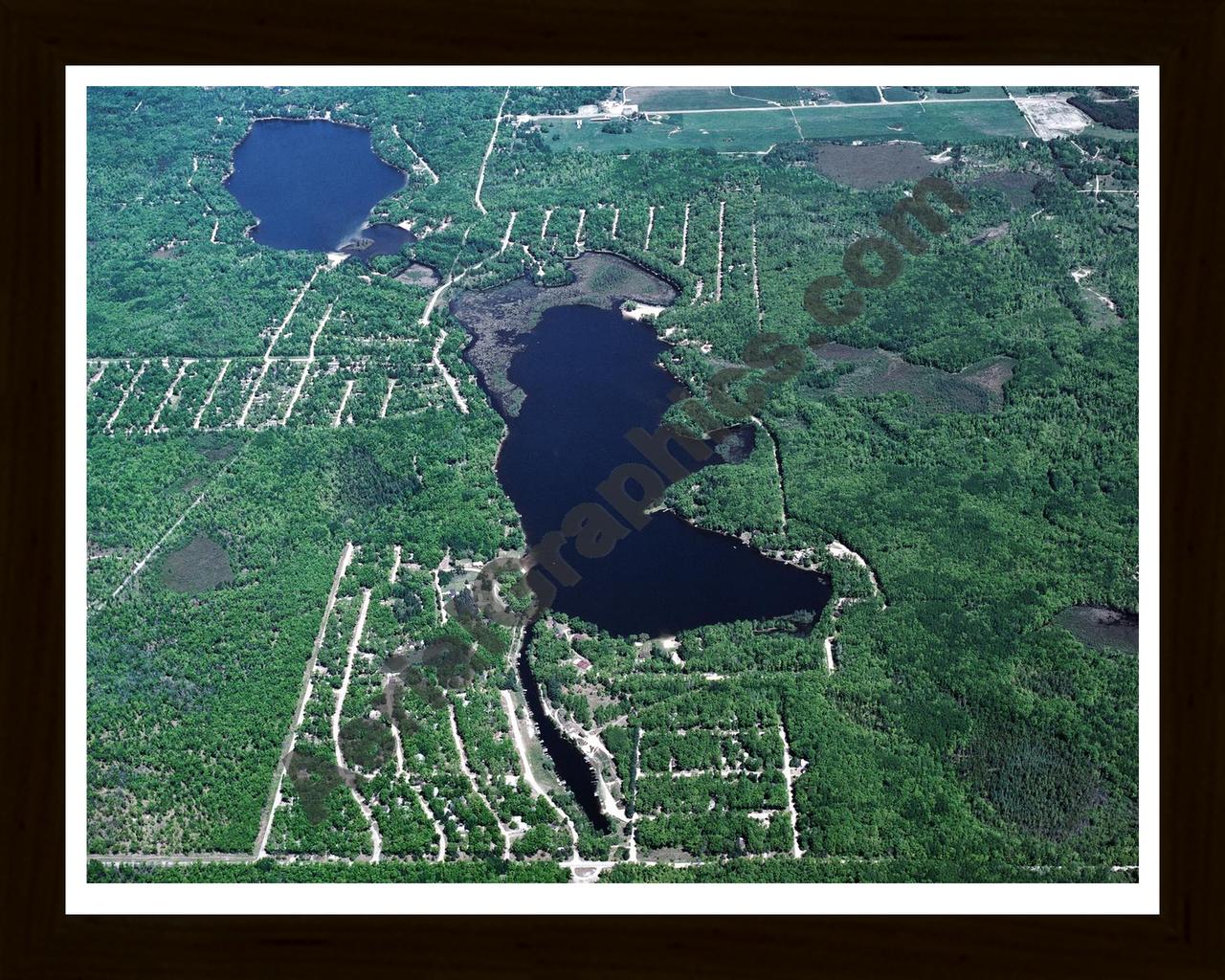 Aerial image of [179] Cranberry Lake in Clare, MI with Black Wood frame