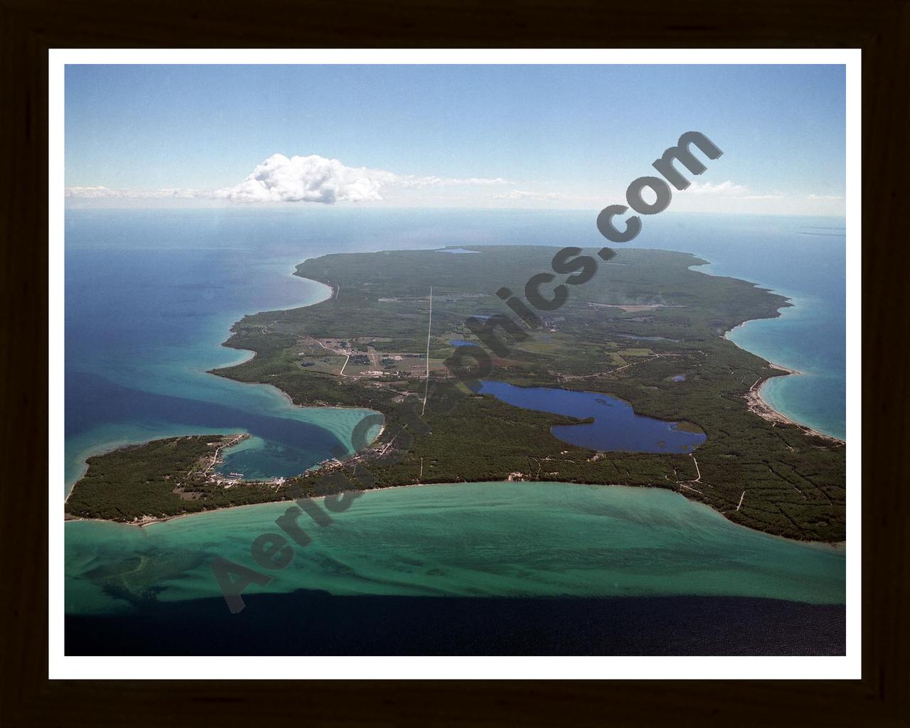 Aerial image of [1928] Beaver Island with Black Wood frame