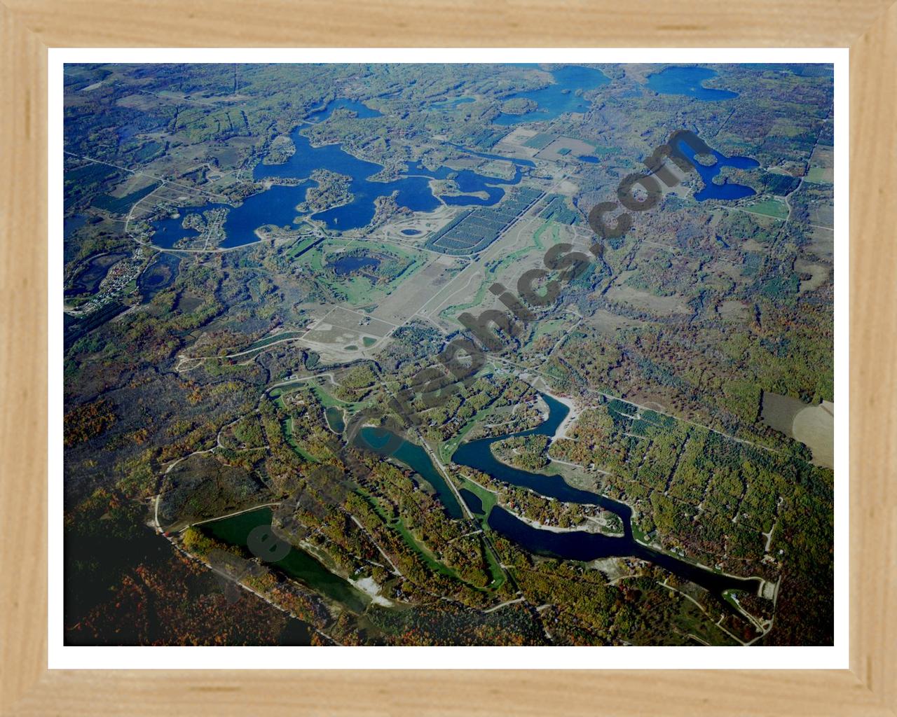 Aerial image of [2052] Canadian Lakes Area in Mecosta, MI with Natural Wood frame