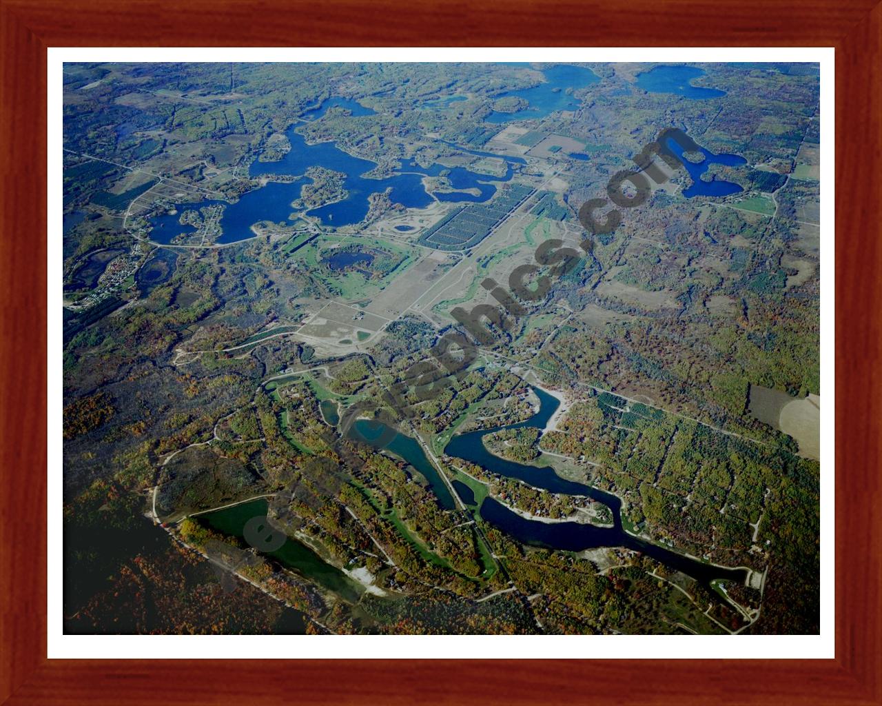 Aerial image of [2052] Canadian Lakes Area in Mecosta, MI with Cherry Wood frame