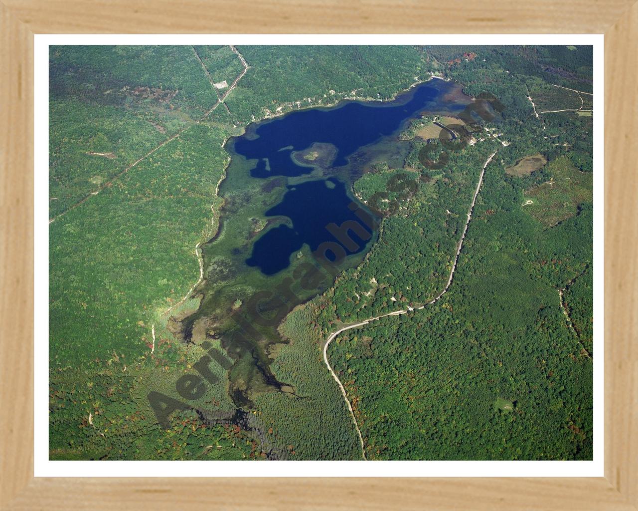 Aerial image of [20] Avery Lake in Montmorency, MI with Natural Wood frame