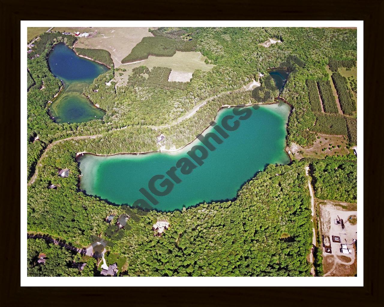 Aerial image of [2152] O'Rourke Lake in Otsego, MI with Black Wood frame