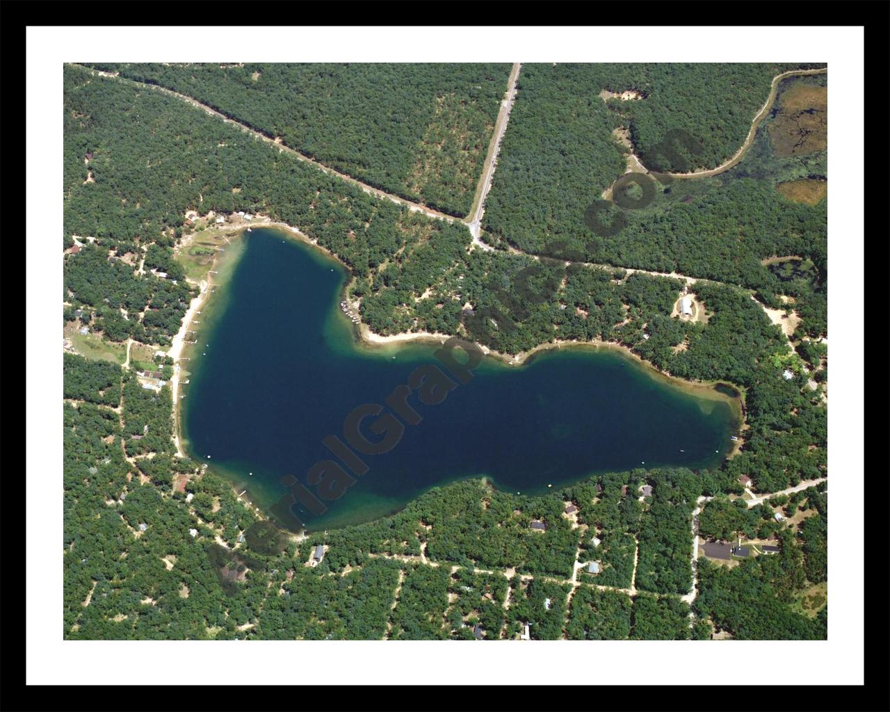 Aerial image of [2154] Cecilia Lake in Lake, MI with Black Metal frame