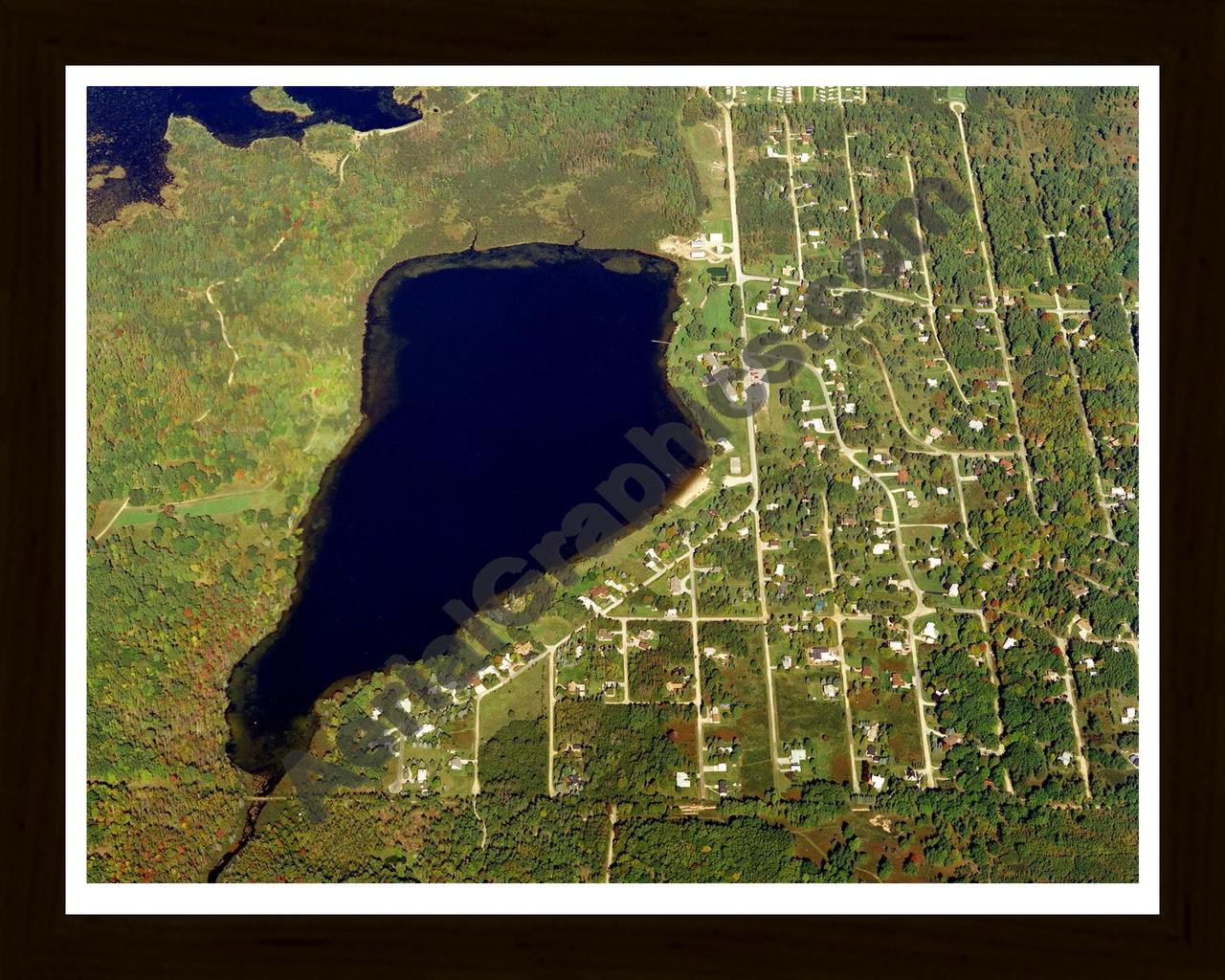 Aerial image of [21] Badger Lake in Alcona, MI with Black Wood frame