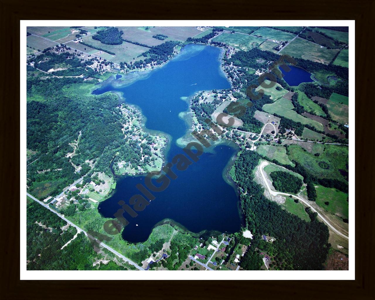 Aerial image of [2465] Pleasant Lake in St Joseph, MI with Black Wood frame