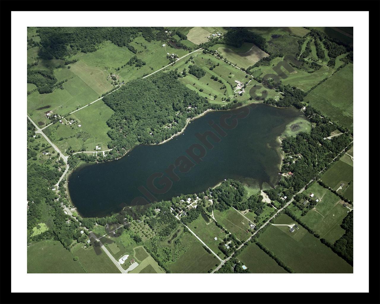 Aerial image of [2487] Clear Lake in Mecosta, MI with Black Metal frame