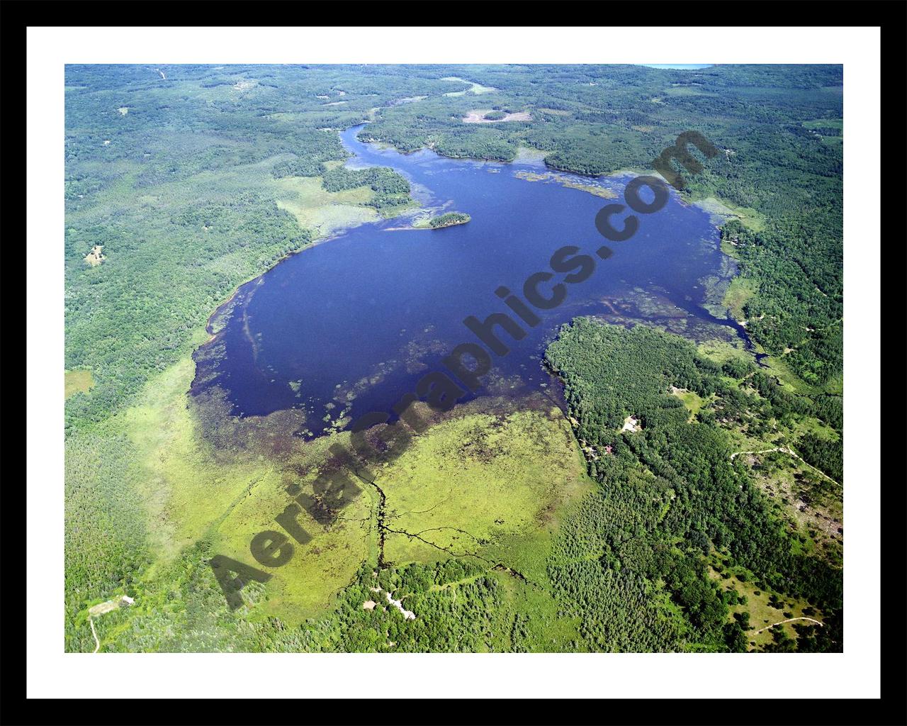 Aerial image of [2494] Grass Lake in Montmorency, MI with Black Metal frame