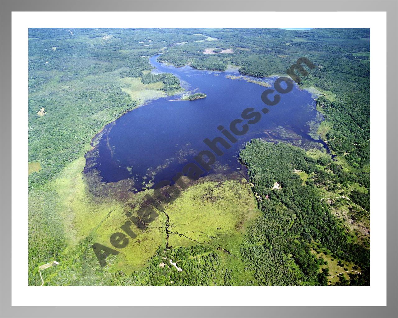 Aerial image of [2494] Grass Lake in Montmorency, MI with Silver Metal frame