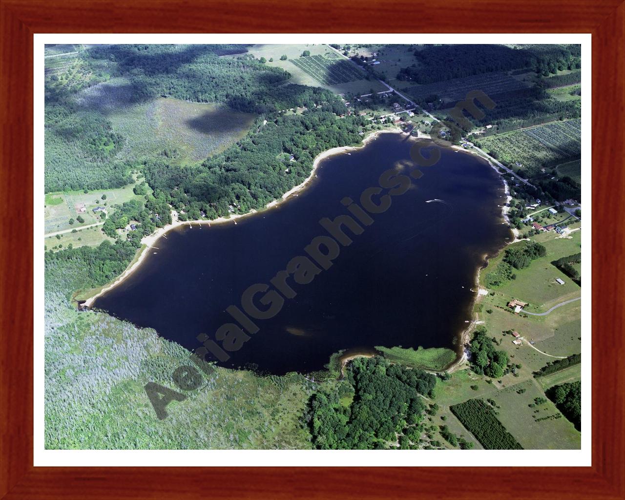 Aerial image of [2508] Pleasant Lake in Wexford, MI with Cherry Wood frame