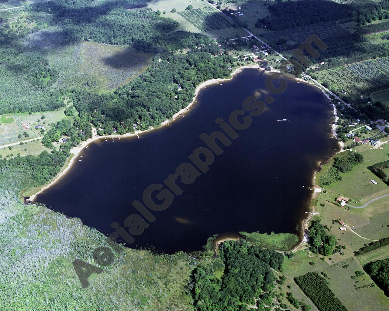 Aerial image of [2508] Pleasant Lake in Wexford, MI with Canvas Wrap frame