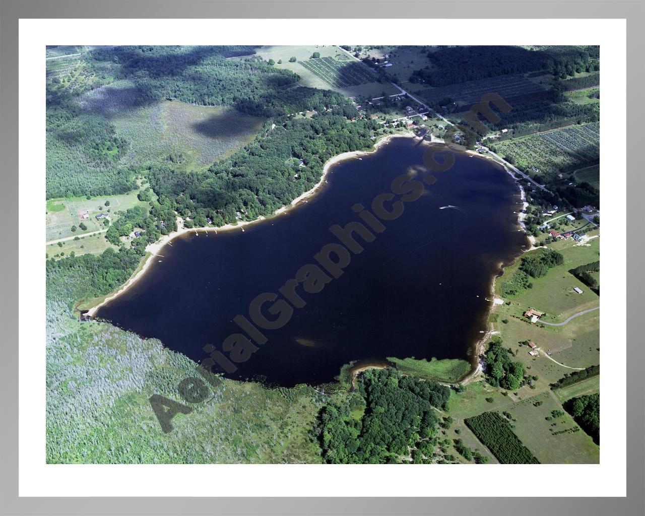 Aerial image of [2508] Pleasant Lake in Wexford, MI with Silver Metal frame