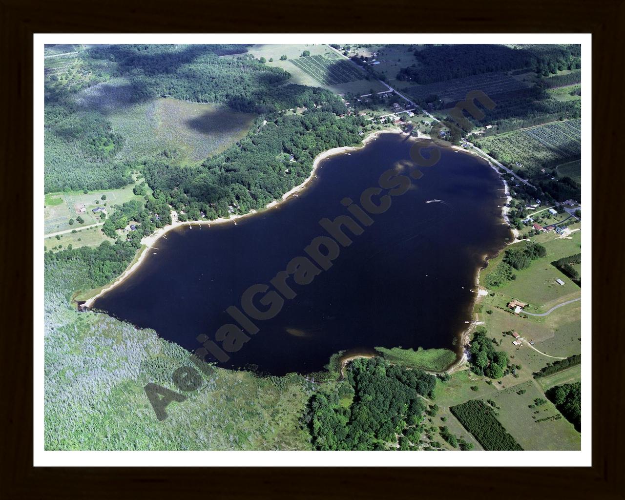 Aerial image of [2508] Pleasant Lake in Wexford, MI with Black Wood frame