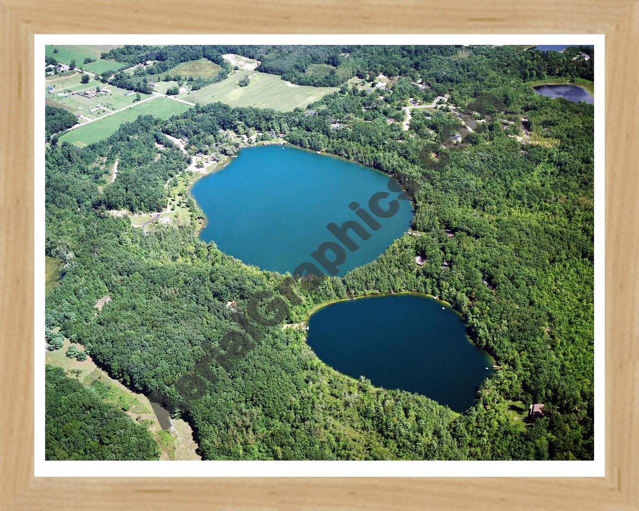 Aerial image of [2556] Olin Lakes in Kent, MI with Natural Wood frame