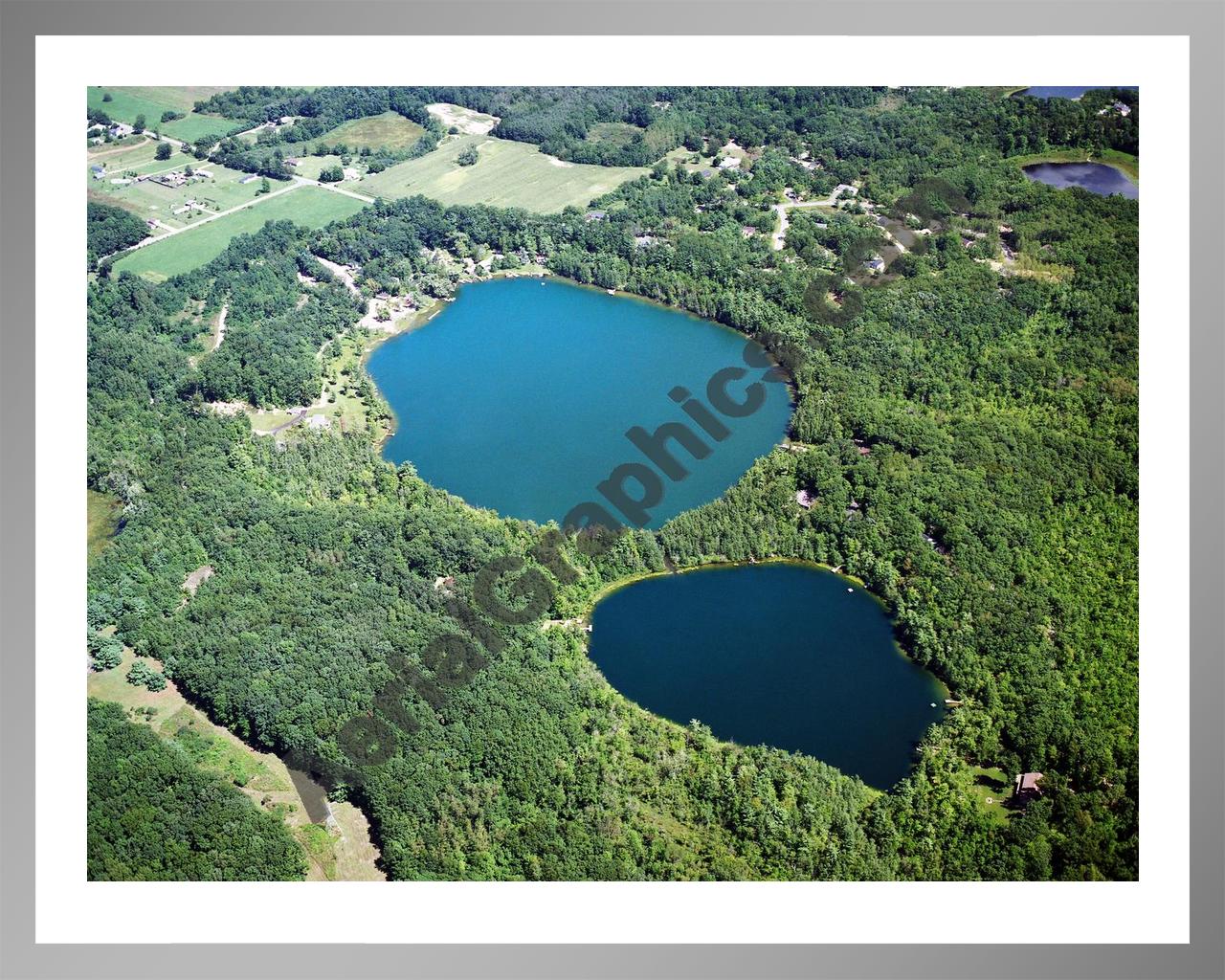 Aerial image of [2556] Olin Lakes in Kent, MI with Silver Metal frame