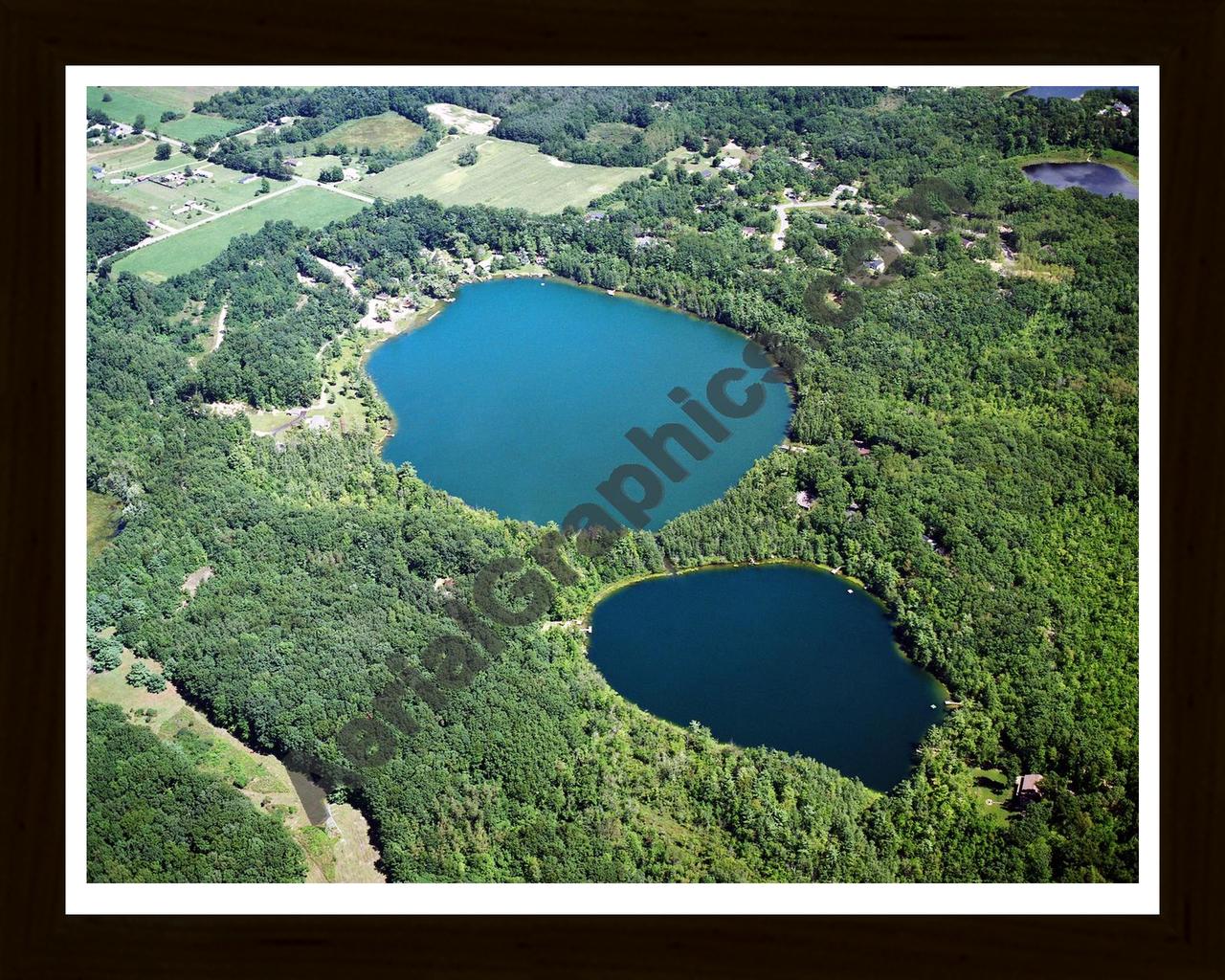 Aerial image of [2556] Olin Lakes in Kent, MI with Black Wood frame