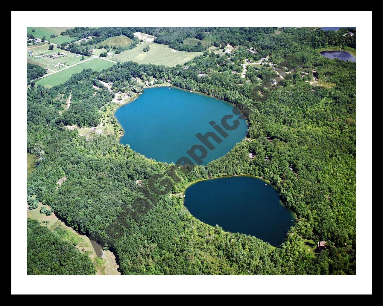 Aerial image of [2556] Olin Lakes in Kent, MI with Black Metal frame