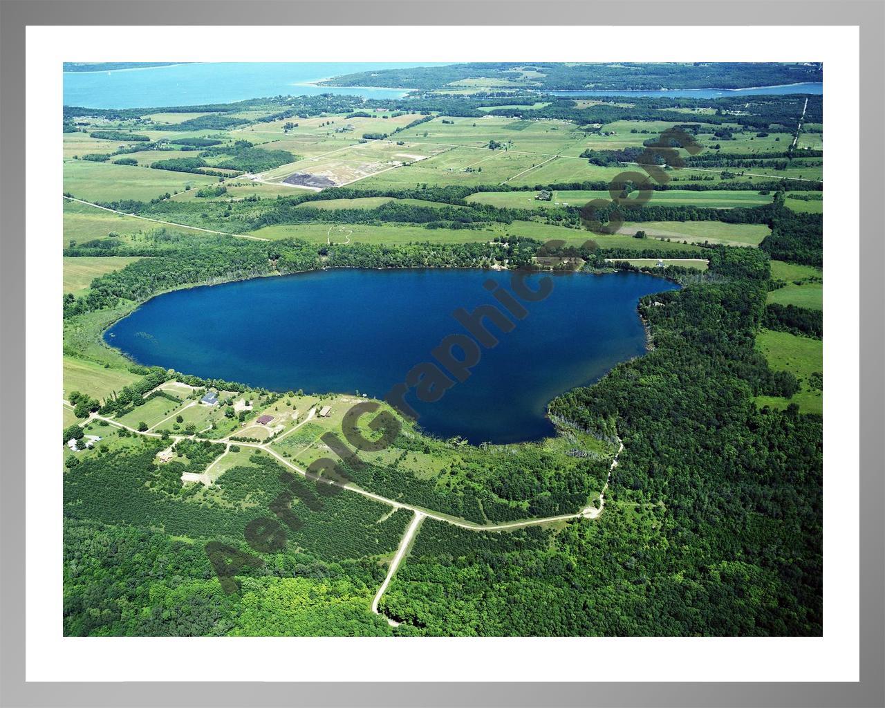 Aerial image of [2563] Nowland Lake in Charlevoix, MI with Silver Metal frame