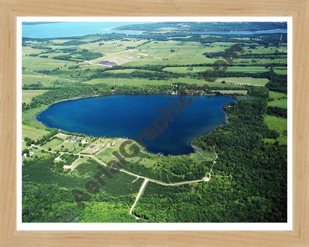 Aerial image of [2563] Nowland Lake in Charlevoix, MI with Natural Wood frame