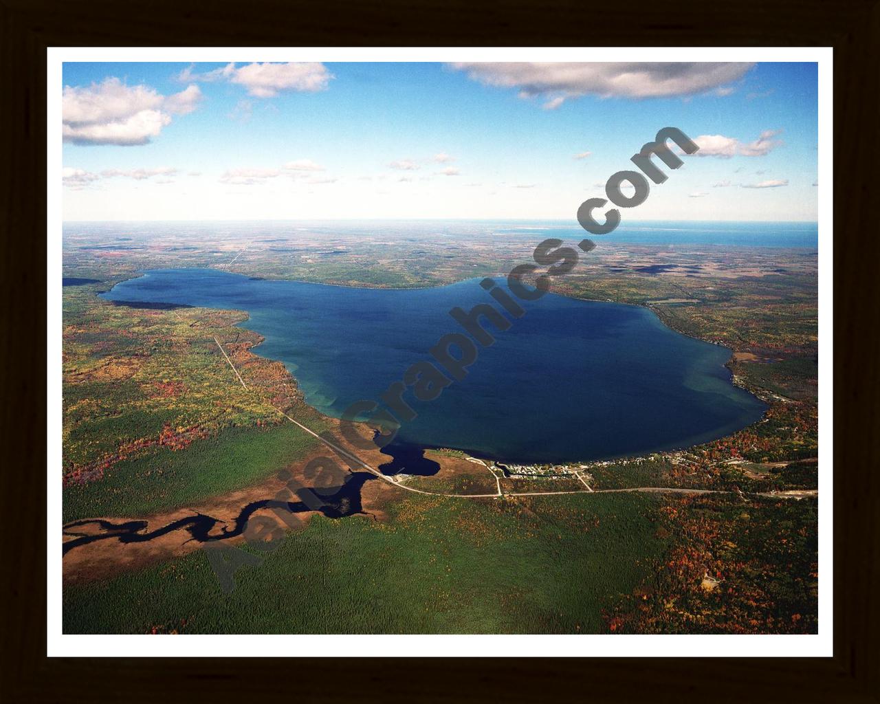 Aerial image of [2717] Hubbard Lake in Alcona, MI with Black Wood frame