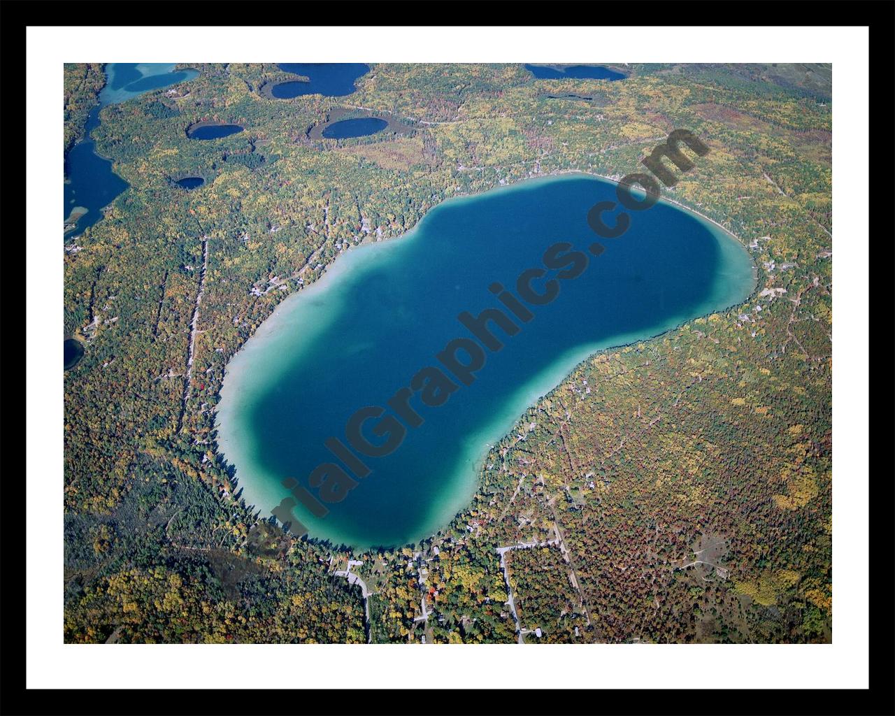 Aerial image of [2718] Avalon Lake (Fall) in Montmorency, MI with Black Metal frame