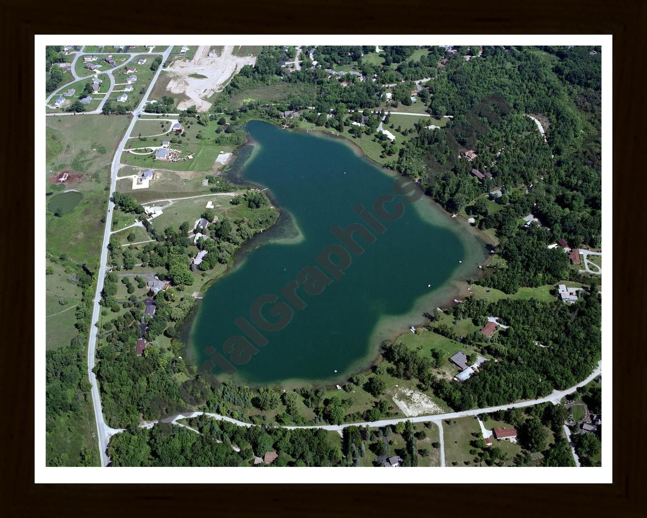 Aerial image of [272] Fish Lake in Livingston, MI with Black Wood frame