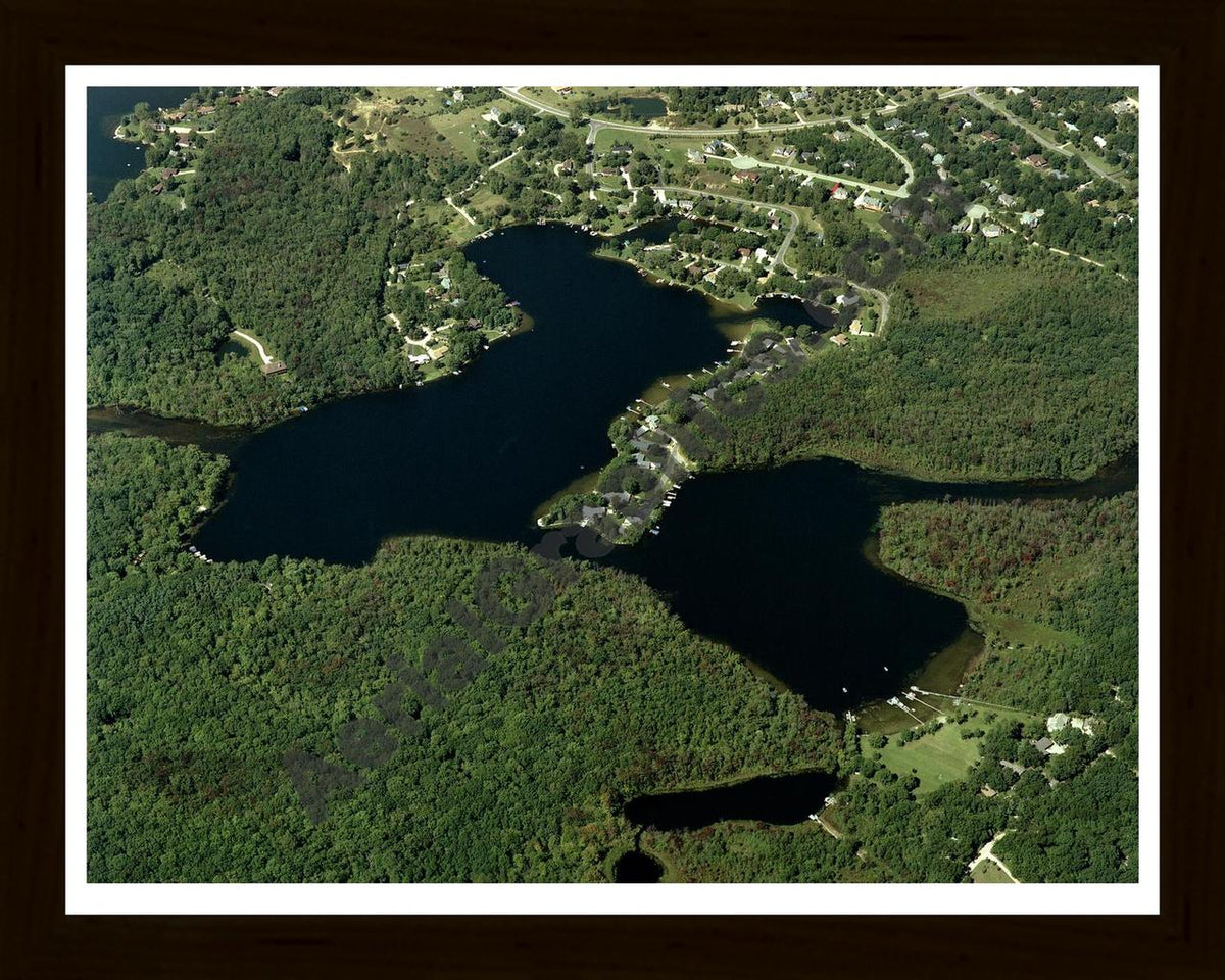 Aerial image of [2966] Whitewood Lakes in Livingston, MI with Black Wood frame